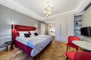 Posteľ alebo postele v izbe v ubytovaní H Aparthotel