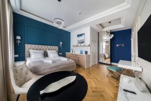 Posteľ alebo postele v izbe v ubytovaní H Aparthotel