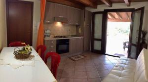 A kitchen or kitchenette at Villa Orizzonte