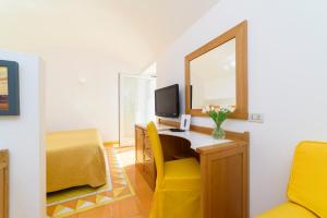 TV a/nebo společenská místnost v ubytování Grand Hotel San Pietro + 37 fotografií