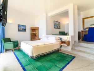 Postel nebo postele na pokoji v ubytování Grand Hotel San Pietro
