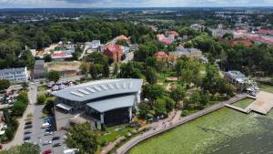 an aerial view of a building in a city at VILLA CAPITOL in Ostróda