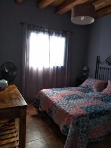 Postel nebo postele na pokoji v ubytování casa de campo :AHICITO