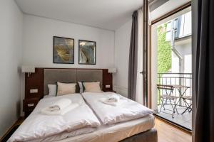 Postel nebo postele na pokoji v ubytování ON/SET APARTHOTEL