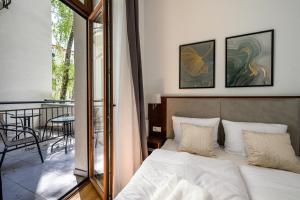 Postel nebo postele na pokoji v ubytování ON/SET APARTHOTEL