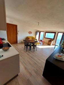 Posezení v ubytování Attico Panoramico Baunei