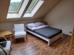 Postel nebo postele na pokoji v ubytování Strumykowa Chata