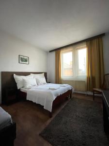 Postel nebo postele na pokoji v ubytování Guest house Elit