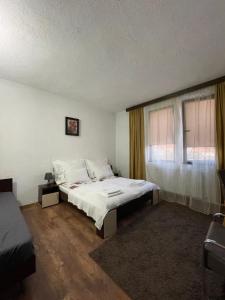 Postel nebo postele na pokoji v ubytování Guest house Elit