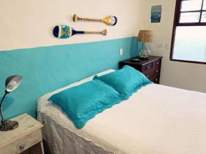 Cama o camas de una habitación en Apartamento Centro Histórico - Vila- Ilhabela