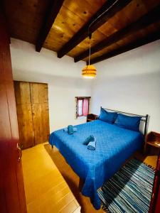 Postel nebo postele na pokoji v ubytování vecchia casa
