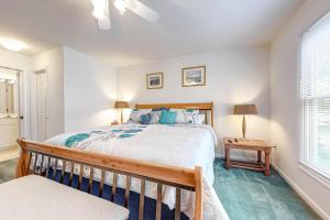 a bedroom with a large bed and a window at Sea Colony Tennis --- 55026 Pine Lake Dr in Bethany Beach