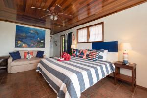 Postel nebo postele na pokoji v ubytování Bella Vista Resort Belize