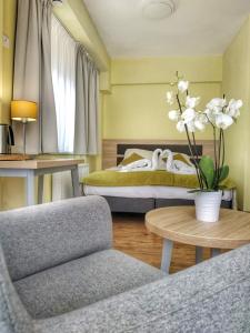 Cama ou camas em um quarto em Sandacz Otmuchów