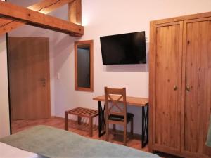 Telewizja i/lub zestaw kina domowego w obiekcie Haus Planegg XL