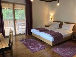 Säng eller sängar i ett rum på Haus Planegg XL
