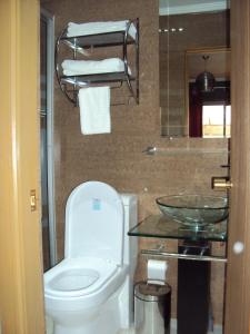 Koupelna v ubytování Apart Hotel Cancura