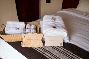 Säng eller sängar i ett rum på Casa Ku Hotel - Adults Only