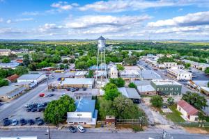 an aerial view of a small town with a water tower at Trails End Retreat in Bandera