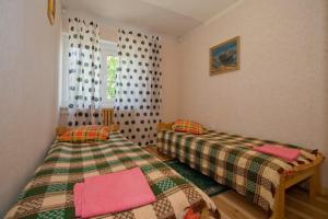 Ένα ή περισσότερα κρεβάτια σε δωμάτιο στο Motelis Aldari
