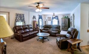 A seating area at Hidden Gem Location, Privacy, Game Room, Hot Tub, Fire Pit, Flat Lot Family Fun
