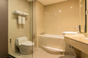 Kylpyhuone majoituspaikassa Antero Hotel Jababeka