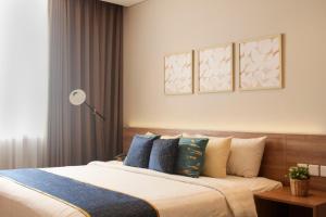 Vuode tai vuoteita majoituspaikassa Antero Hotel Jababeka