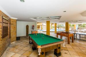 Mesa de bilhar em Pizzato Praia Hotel
