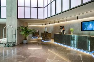 The lobby or reception area at Pullman Tbilisi Axis Towers