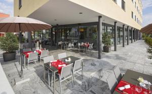 Restoran või mõni muu söögikoht majutusasutuses Villmergen Swiss Quality Hotel