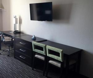 TV a/nebo společenská místnost v ubytování Residency Suites