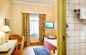 Katil atau katil-katil dalam bilik di Hotel Royal