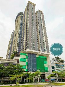 a large building with a sign that readsmoska at Mosaic Southkey Midvelly By Elegant Johor Bahru in Johor Bahru