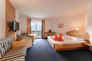 TV a/nebo společenská místnost v ubytování Hotel Garni Katnau