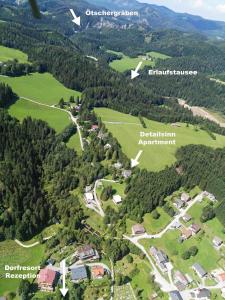 an aerial view of a park with trees and buildings at Detailsinn Apartment - DorfResort Mitterbach in Mitterbach