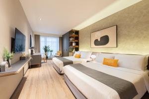 A bed or beds in a room at Dash Living on Prat