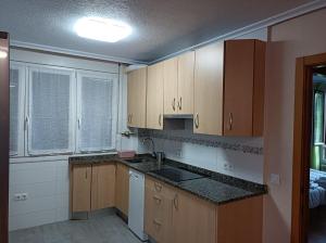 Kuchyňa alebo kuchynka v ubytovaní Fantástico apartamento en las playas de Suances