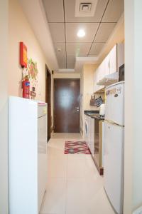 Kuchyň nebo kuchyňský kout v ubytování Cosy Studio - Low Floor - Fully Equipped
