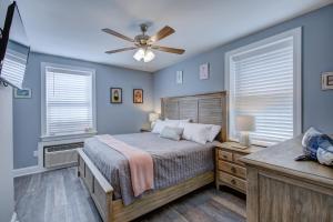 a bedroom with a bed and a ceiling fan at Town of Rehoboth Beach 20D Baltimore Ave in Rehoboth Beach