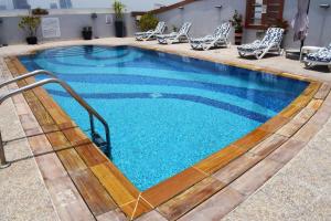 Bazén v ubytování Signature Hotel Al Barsha nebo v jeho okolí