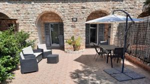 A patio or other outdoor area at Ninetta House