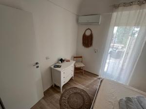 A bed or beds in a room at Ninetta House