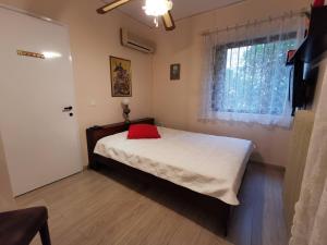 Postel nebo postele na pokoji v ubytování Anna Nafplio Appartment