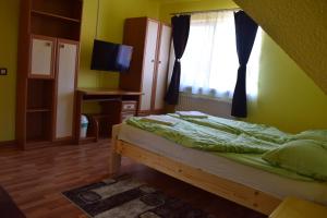 Letto o letti in una camera di Gamma