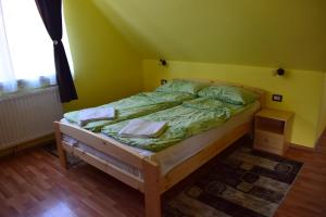 Letto o letti in una camera di Gamma