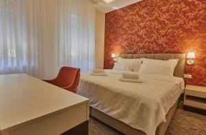 Llit o llits en una habitació de Cataleya