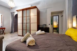 מיטה או מיטות בחדר ב-Casa la Tercia, Parking incluido en pleno casco histórico