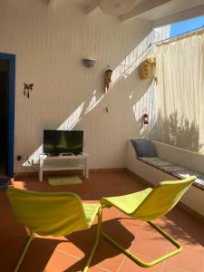 TV a/nebo společenská místnost v ubytování Villa Agata