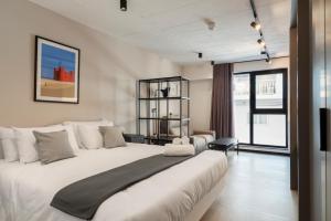 Postel nebo postele na pokoji v ubytování Aparthotel Adagio Malta Central + 37 fotografií