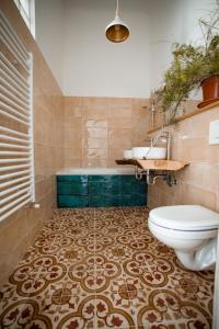 Kúpeľňa v ubytovaní BudapeStayz - Bacso Apartments